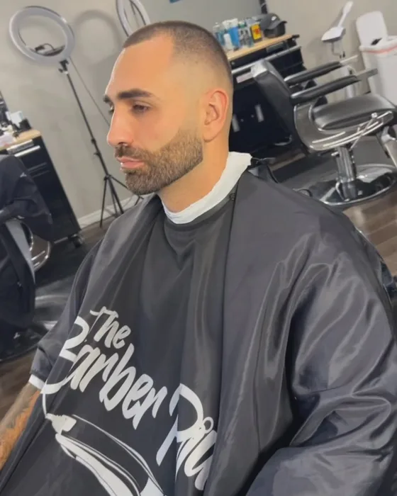 Bald cut with full beard sculpt